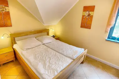 Ein Bett oder Betten in einem Zimmer der Unterkunft Freesenkietz, FW 28