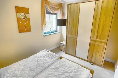 Ein Bett oder Betten in einem Zimmer der Unterkunft Freesenkietz, FW 28