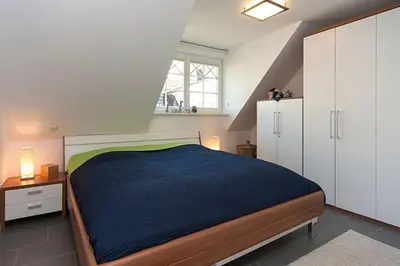 Ein Bett oder Betten in einem Zimmer der Unterkunft Les Belles, Haus Cecile, FW Attractive, Whg 4