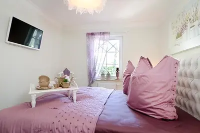 Ein Bett oder Betten in einem Zimmer der Unterkunft Les Belles, Haus Bastien, FW Galant, Whg 6
