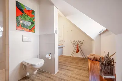 Ein Badezimmer in der Unterkunft Les Belles, Haus Cecile, FW Romantique, Whg 5