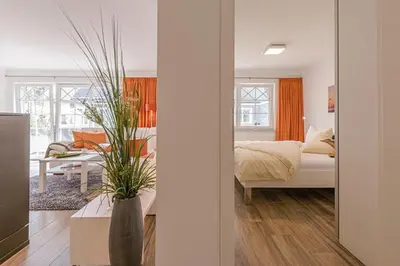 Ein Bett oder Betten in einem Zimmer der Unterkunft Les Belles, Haus Davide, FW Exclusive, Whg 7