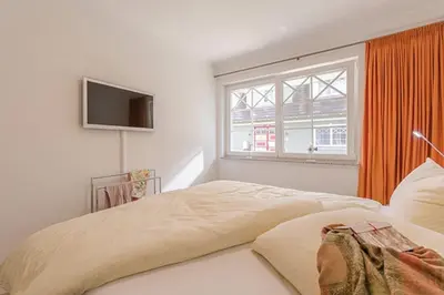 Ein Bett oder Betten in einem Zimmer der Unterkunft Les Belles, Haus Davide, FW Exclusive, Whg 7