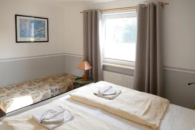 Ein Bett oder Betten in einem Zimmer der Unterkunft Kolja