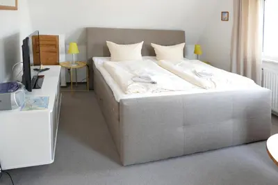 Ein Bett oder Betten in einem Zimmer der Unterkunft Silja