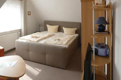 Ein Bett oder Betten in einem Zimmer der Unterkunft Linda