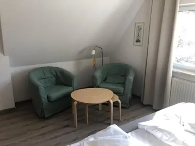 Ein Sitzbereich in der Unterkunft Linda