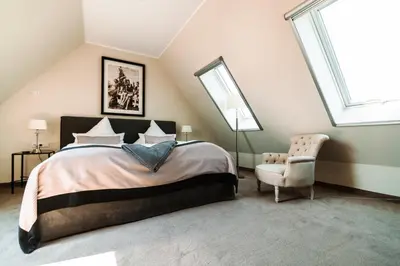 Ein Bett oder Betten in einem Zimmer der Unterkunft Apartmentanlage Seezeichen