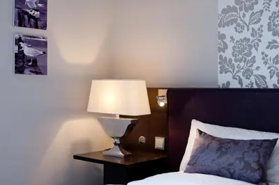 Ein Bett oder Betten in einem Zimmer der Unterkunft Apartmentanlage Seezeichen