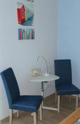 Ein Sitzbereich in der Unterkunft Seeschwalbe App 34
