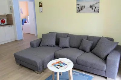 Ein Sitzbereich in der Unterkunft Seeschwalbe App 34