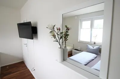 Ein Bett oder Betten in einem Zimmer der Unterkunft Strandlust V6W1