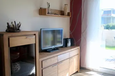 TV/Unterhaltungsangebot in der Unterkunft Strandhafer V4W2