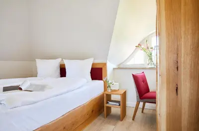 Ein Bett oder Betten in einem Zimmer der Unterkunft Ferienhaus Seeadler 34