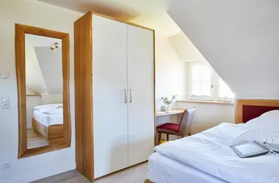 Ein Bett oder Betten in einem Zimmer der Unterkunft Ferienhaus Seeadler 34
