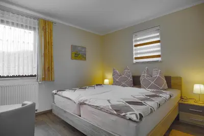 Ein Bett oder Betten in einem Zimmer der Unterkunft Barth, Dieter