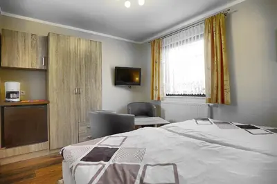 Ein Bett oder Betten in einem Zimmer der Unterkunft Barth, Dieter