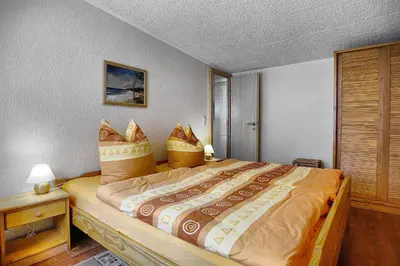 Ein Bett oder Betten in einem Zimmer der Unterkunft Barth, Dieter