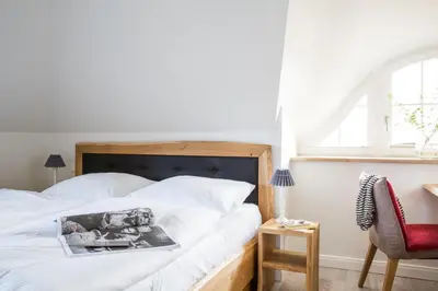 Ein Bett oder Betten in einem Zimmer der Unterkunft Ferienhaus Seeadler 9