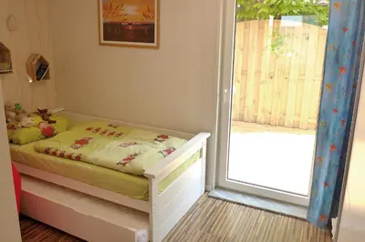 Ein Bett oder Betten in einem Zimmer der Unterkunft Achterdeck FW 2