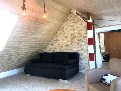 Ein Sitzbereich in der Unterkunft Brückendeck App 3