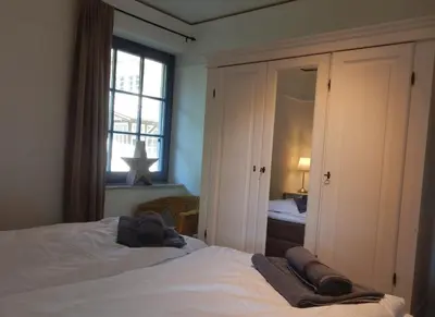 Ein Bett oder Betten in einem Zimmer der Unterkunft Eichenpark 33