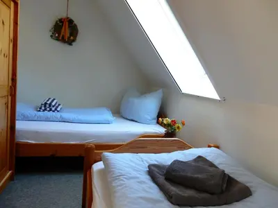 Ein Bett oder Betten in einem Zimmer der Unterkunft Eichenpark 34