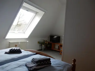 Ein Bett oder Betten in einem Zimmer der Unterkunft Eichenpark 34