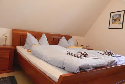 Ein Bett oder Betten in einem Zimmer der Unterkunft Eichenpark 45