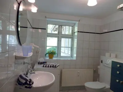 Ein Badezimmer in der Unterkunft Eichenpark 52