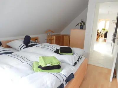 Ein Bett oder Betten in einem Zimmer der Unterkunft Hinter den Dünen D60