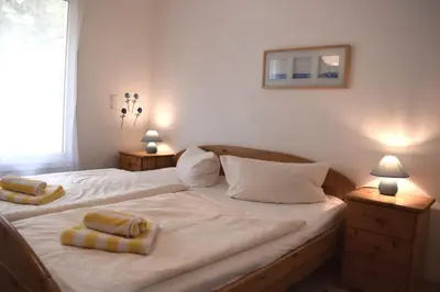 Ein Bett oder Betten in einem Zimmer der Unterkunft Hinter den Dünen D80