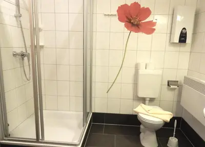 Ein Badezimmer in der Unterkunft Hinter den Dünen D80