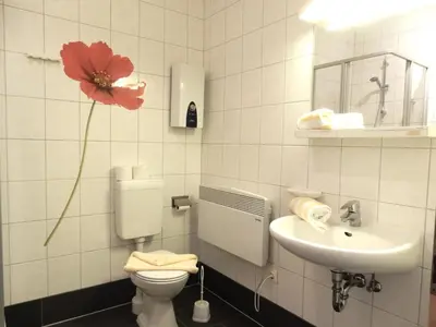 Ein Badezimmer in der Unterkunft Hinter den Dünen D80