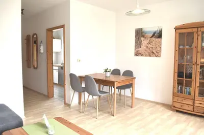 Ein Sitzbereich in der Unterkunft Hinter den Dünen D80