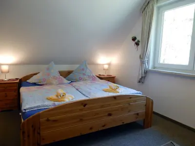 Ein Bett oder Betten in einem Zimmer der Unterkunft Hinter den Dünen D83