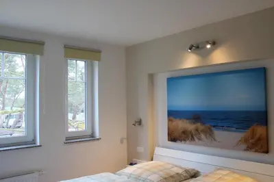 Ein Bett oder Betten in einem Zimmer der Unterkunft Strandvilla Sophie App 2