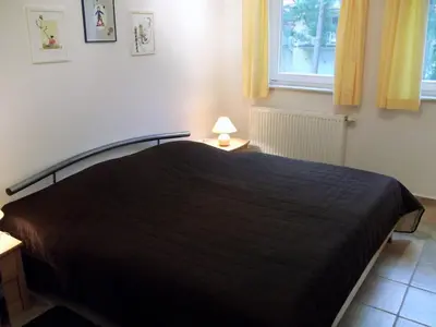 Ein Bett oder Betten in einem Zimmer der Unterkunft Meeresbrise 06