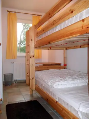 Ein Bett oder Betten in einem Zimmer der Unterkunft Meeresbrise 06