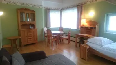 Ein Bett oder Betten in einem Zimmer der Unterkunft Hotel Haus Linden