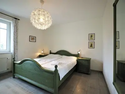 Ein Bett oder Betten in einem Zimmer der Unterkunft Mittenzwey FW 1