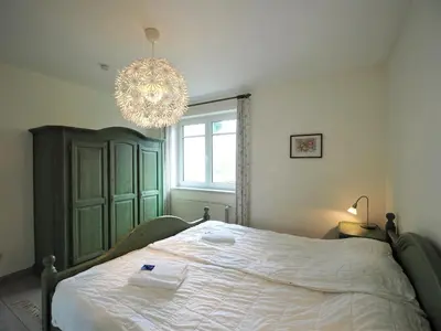 Ein Bett oder Betten in einem Zimmer der Unterkunft Mittenzwey FW 1