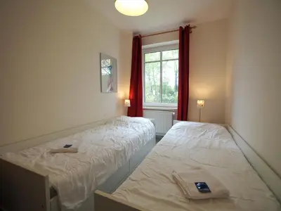 Ein Bett oder Betten in einem Zimmer der Unterkunft Mittenzwey FW 1