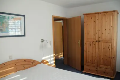 Ein Bett oder Betten in einem Zimmer der Unterkunft Boddenwelle