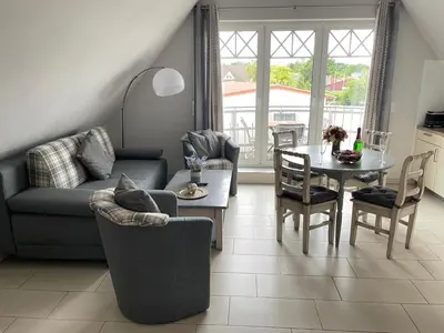 Ein Sitzbereich in der Unterkunft Ferienwohnung Hafenstrasse