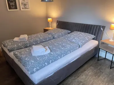 Ein Bett oder Betten in einem Zimmer der Unterkunft Juro