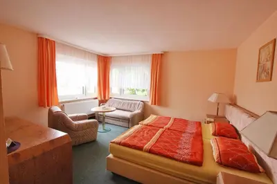 Ein Bett oder Betten in einem Zimmer der Unterkunft Pension 