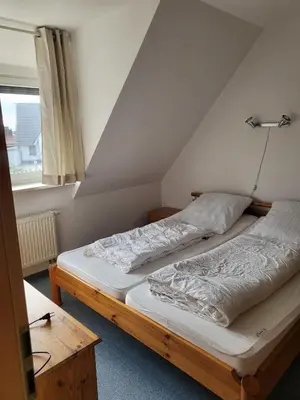 Ein Bett oder Betten in einem Zimmer der Unterkunft Luv