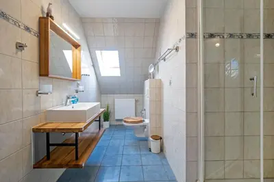 Ein Badezimmer in der Unterkunft Traumzeit, FW 1