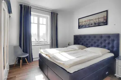 Ein Bett oder Betten in einem Zimmer der Unterkunft Villa Balticum, Whg 4